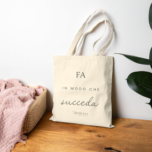 Borsa in cotone con citazione motivazionale "Fa in modo che succeda".
